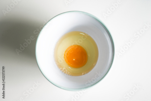 white and egg filled on a ceramic bowl