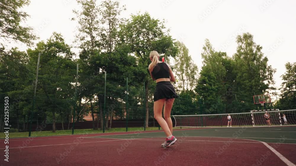women are training on tennis court in open sport ground in summer day, female tennis player women are training on tennis court in open sport ground in summer day, female tennis player