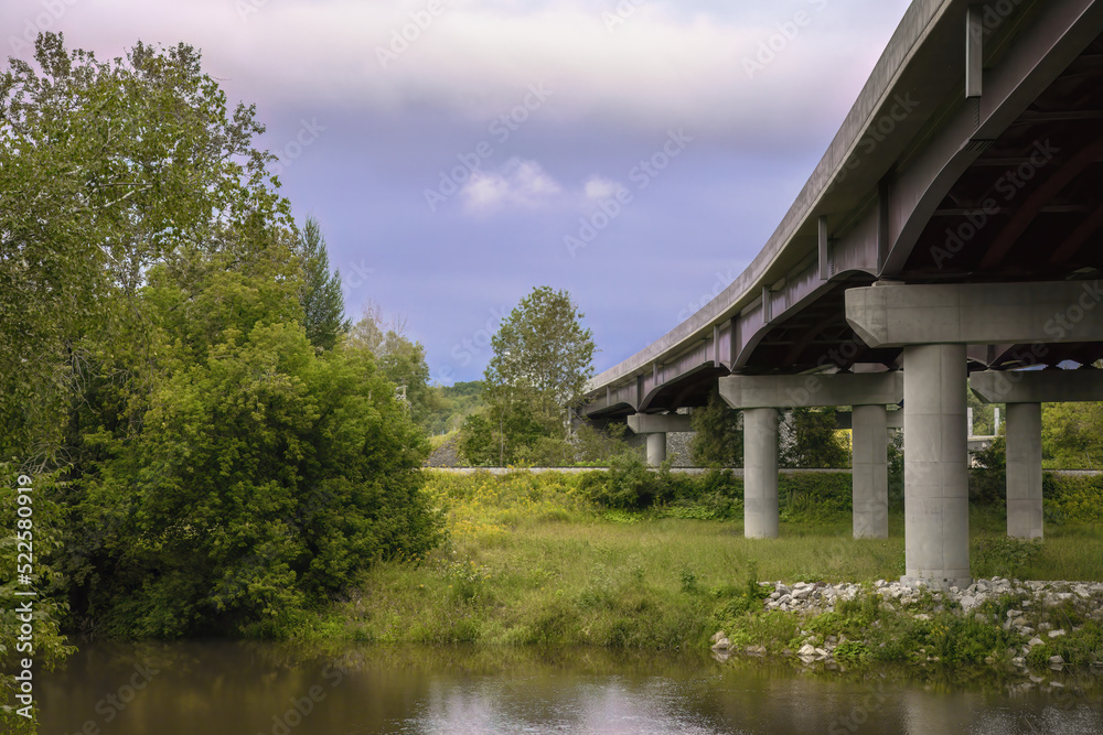 environment and transportation bridge river landscape trees and water reflections