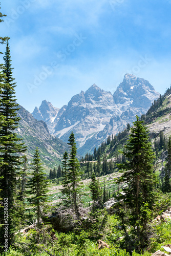 Beautiful valley featuring the Grand Teton mountains along the Lake Solitude trail, Wyoming