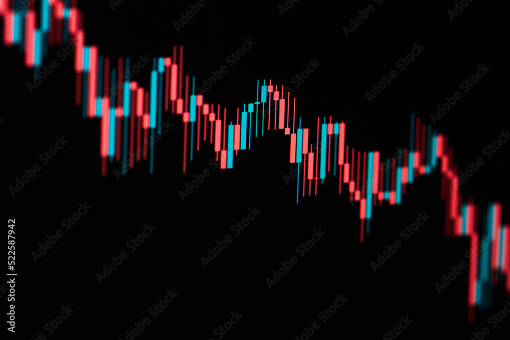 Falling stock market chart on dark background
