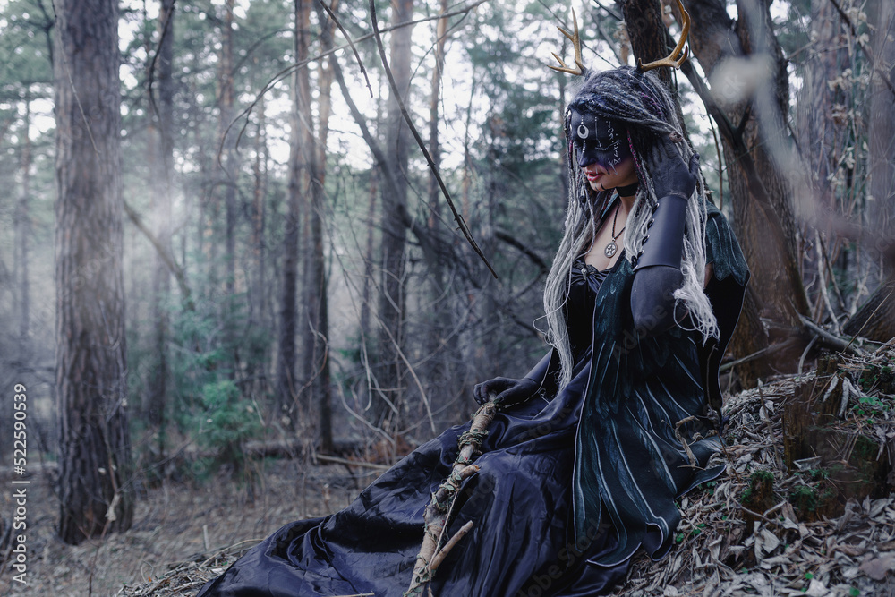 Forest witch in a pine forest Forest witch in a pine forest
