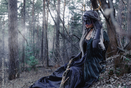 Obraz na plátně Forest witch in a pine forest