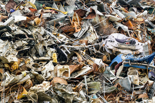 Household and industrial metal rubbish pile at scrap yard