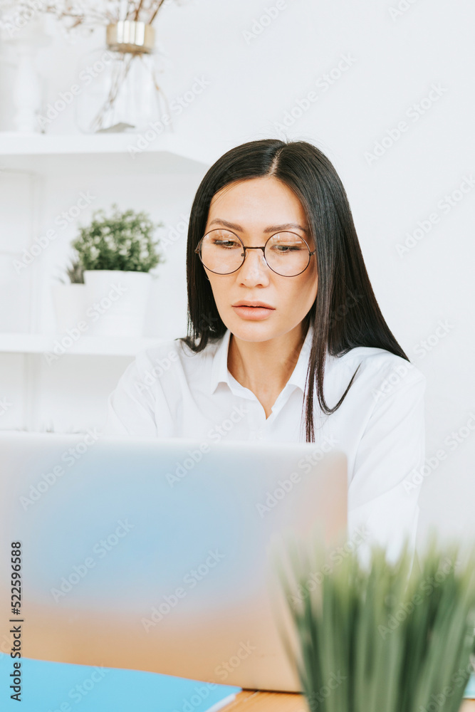 young asian business woman professional in formal wear clothes work in modern office using laptop, tablet, brainstorm and search for solutions, confident independent Asian girl solves problems young asian business woman professional in formal wear clothes work in modern office using laptop, tablet, brainstorm and search for solutions, confident independent Asian girl solves problems