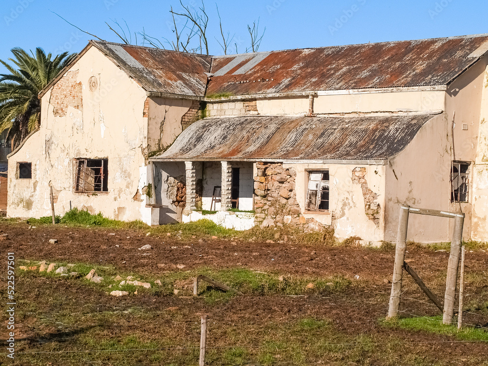 Derelict rural property with building in disrepair