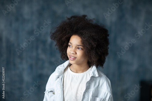 School portrait of a beautiful smiling african girl indoors © BestForYou