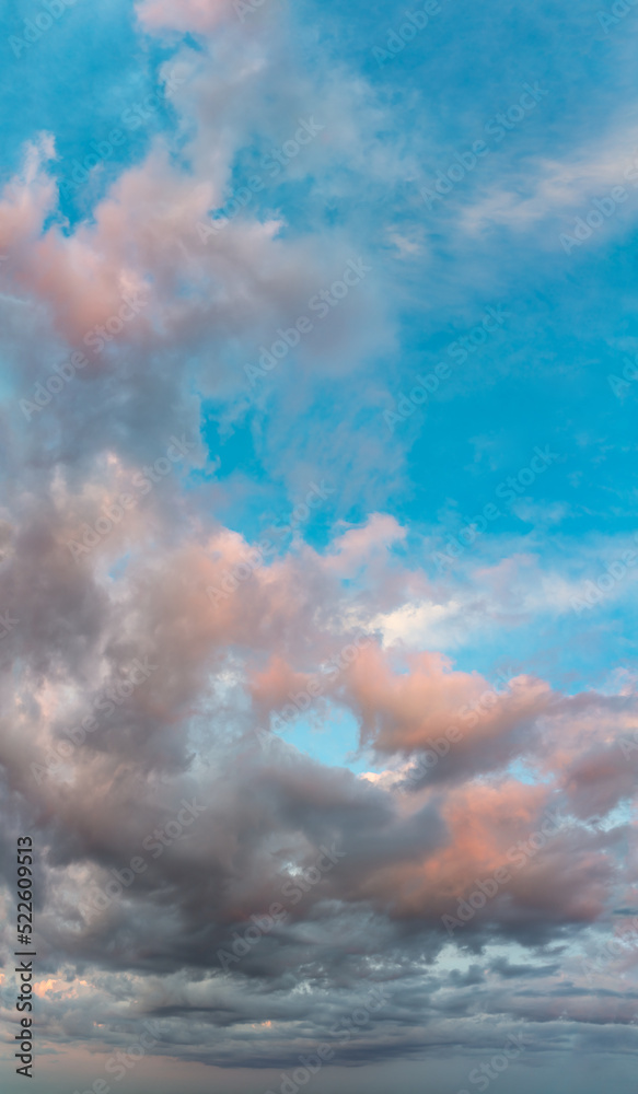 Fantastic clouds at sunrise, vertical panorama Fantastic clouds at sunrise, vertical panorama