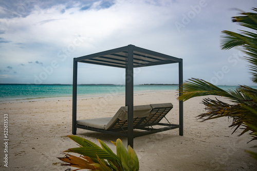 Fototapeta Naklejka Na Ścianę i Meble -  Pergola at the beautiful tropical beach in Maldives Island 2022 