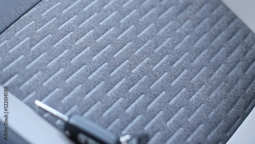 Car seat with fabric upholstery. Close-up. Rag interior trim.