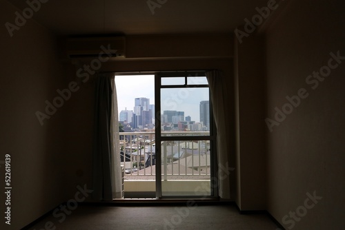 Fototapeta Naklejka Na Ścianę i Meble -  The scenery seen from the window of a vacant studio apartment.Sendai City, Miyagi Prefecture Japan August 2022.