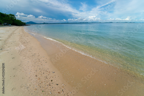 Fototapeta Naklejka Na Ścianę i Meble -  Sea wave white sand beach blue sky fluffy cloud summer vacation