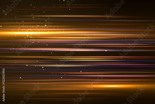 Glowing streaks.Beautiful light flares on dark background. Luminous abstract sparkling lined background. light effect wallpaper.