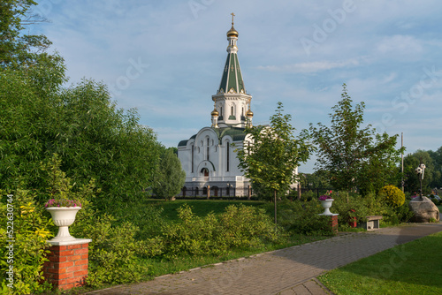 Photos View of the Church of the Blessed Prince Alexander Nevsky on a sunny summer day,