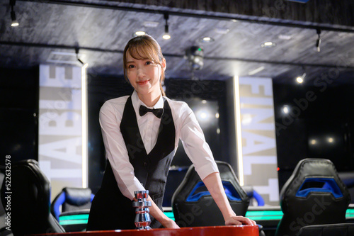Billede på lærred Image of a beautiful casino dealer.