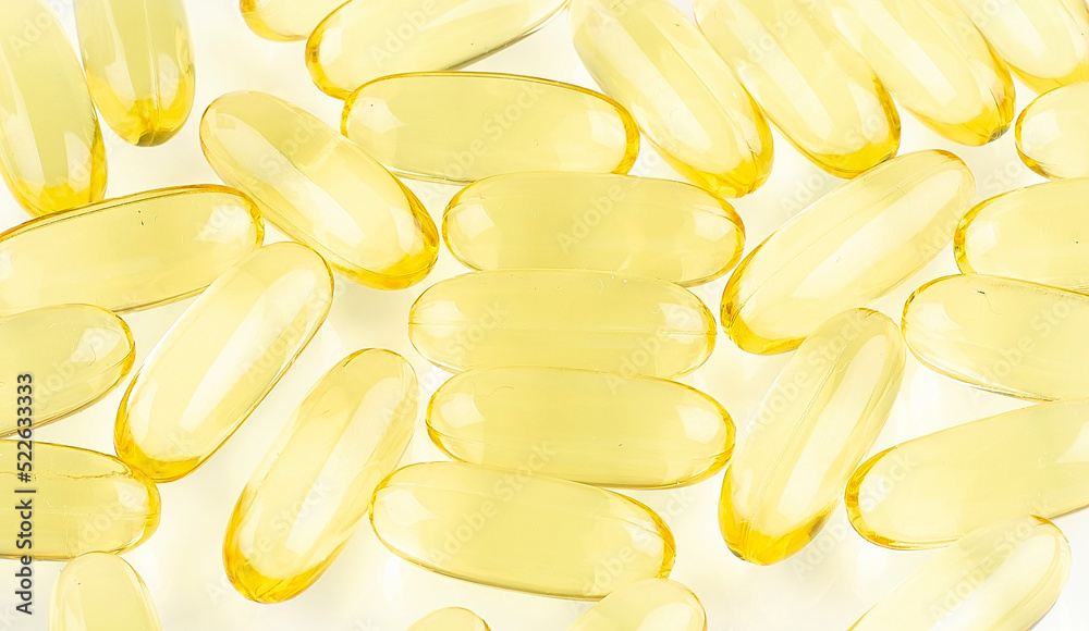 Fish oil capsules, vitamin Omega-3 on the white background Fish oil capsules, vitamin Omega-3 on the white background