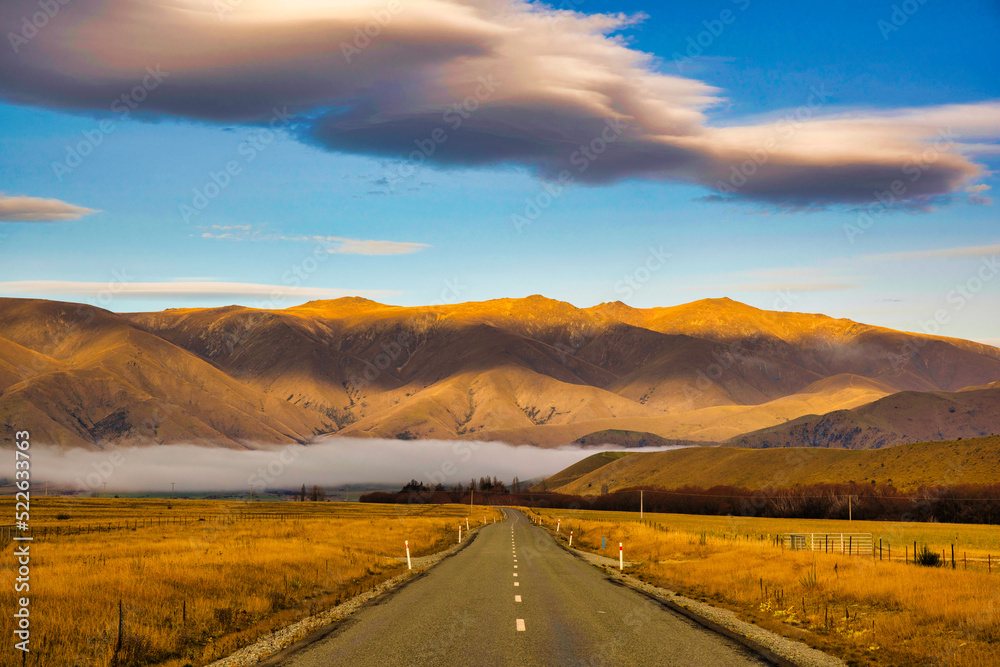 Low and high cloud formations over the mountains at Ohau road near Twizel