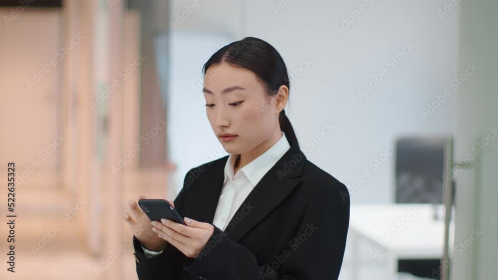 Life online. Young asian woman manager web surfing on smartphone, reading social media on cellphone, free space Life online. Young asian woman manager web surfing on smartphone, reading social media on cellphone, free space
