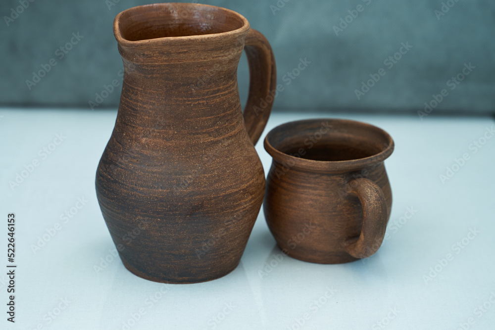       Ceramics, a ceramic product made with your own hands, made on a potter's wheel, a jug, a mug, clay.   