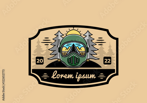 a trail helmet with a pine tree beside