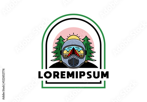 a trail helmet with a pine tree beside