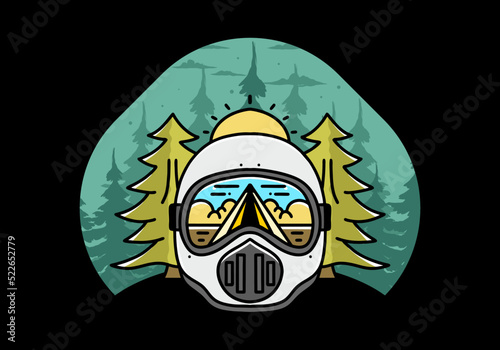 a trail helmet with a pine tree beside