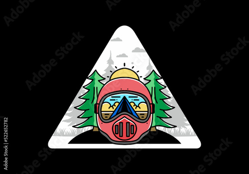a trail helmet with a pine tree beside