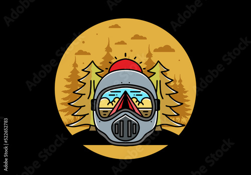a trail helmet with a pine tree beside