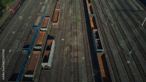 The train wagons in logistic hub. Aerial view from drone. 