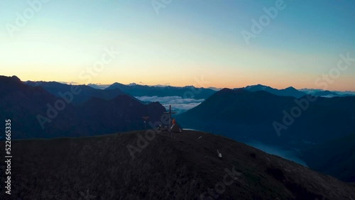 A view of an adventurer camping on summit of Grober Asitz in Salzburg austia. photo
