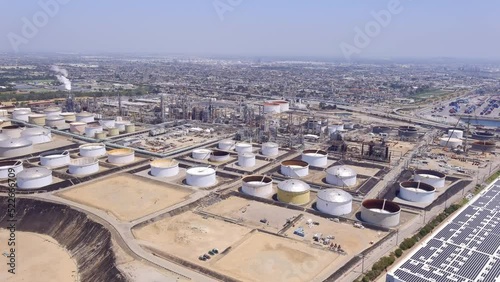 Aerial flyover of the San Pedro oil refinery that produces gasoline, diesel, aviation fuel and fuel-grade petroleum coke - rising fuel prices
