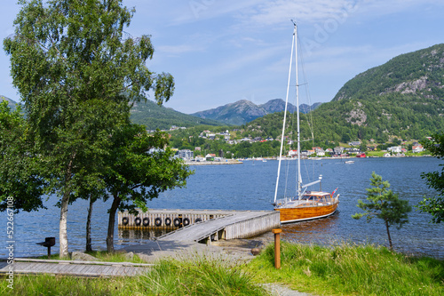 Sailing boat tied up near Jørpeland city in Norway the panorama of Jørpelandsholmen Klungholmen photo