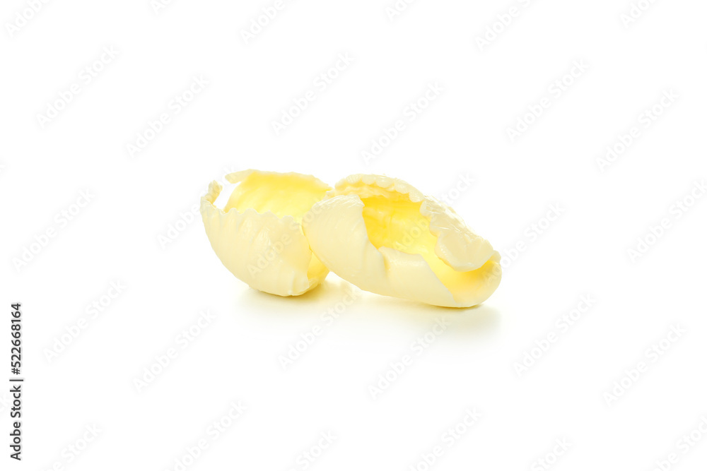 Curls of butter isolated on white background Curls of butter isolated on white background