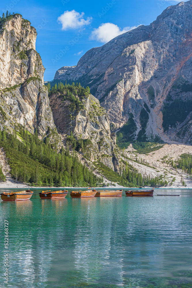 Boats in the rain on the beautiful Lago di Braies, Italy Boats in the rain on the beautiful Lago di Braies, Italy