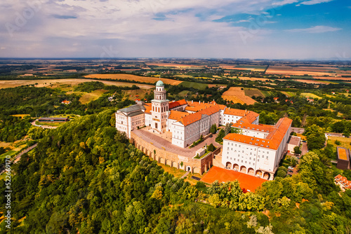 Aerial View of Pannonhalma Archabbey Hungary. Pannonhalma Abbey library interior in Hungary. UNESCO World Heritage Site. Discover the beauties of Hungary... photo