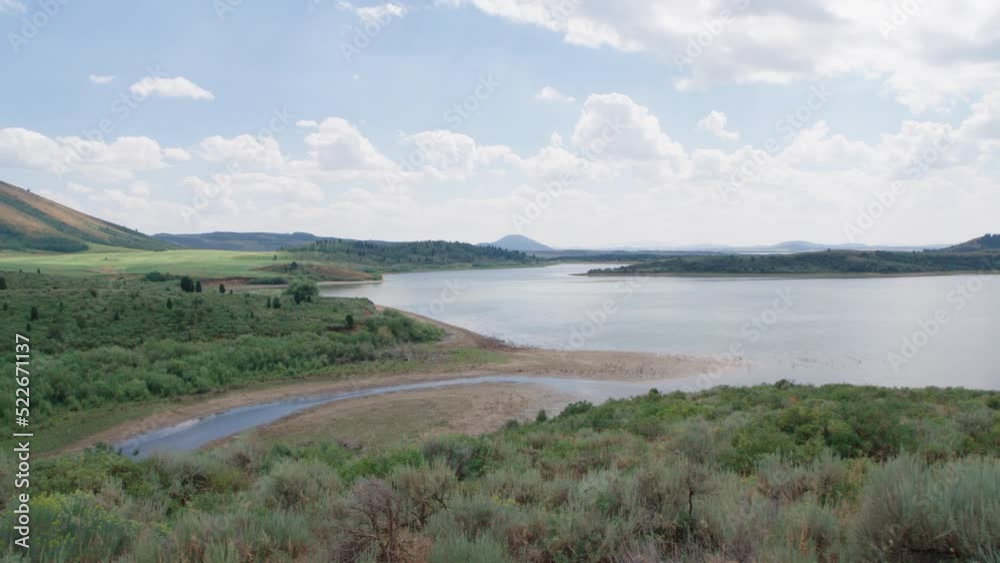 Green fields, mountains, water and inlets show the beauty of Caribou County Idaho. The Blackfoot Reservoir is a lake north of Soda Springs. Green fields, mountains, water and inlets show the beauty of Caribou County Idaho. The Blackfoot Reservoir is a lake north of Soda Springs.