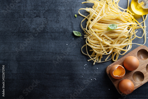 Homemade pasta on dark background