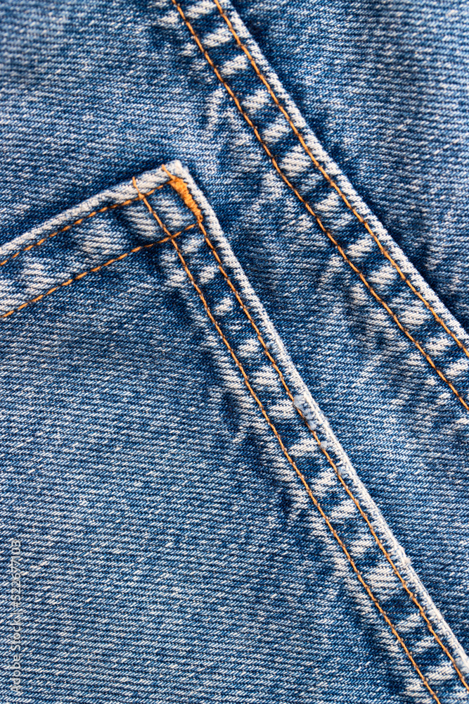 texture of blue cotton fabric with white threads and a pocket on jeans texture of blue cotton fabric with white threads and a pocket on jeans