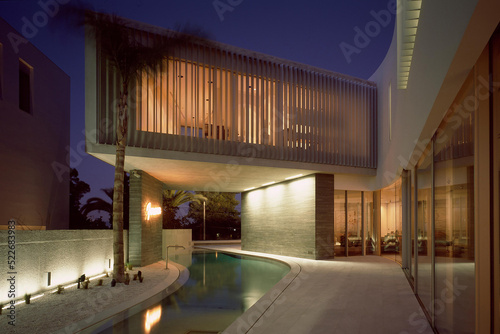 Canvas-taulu Modern luxury villa exterior with swimming pool, dusk shot, 3d rendering