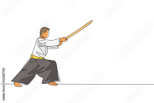 One single line drawing of young energetic man wearing kimono exercise aikido technique with wooden sword in sport hall vector illustration. Health lifestyle sport concept. Continuous line draw design