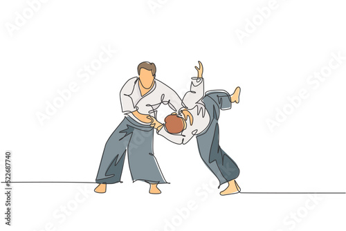 One continuous line drawing young man aikido fighter practice fighting trick at dojo training center. Martial art combative sport concept. Dynamic single line draw graphic design vector illustration