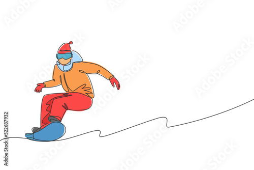 One single line drawing young energetic snowboarder man ride fast snowboard at snowy mountain graphic vector illustration. Tourist vacation lifestyle sport concept. Modern continuous line draw design