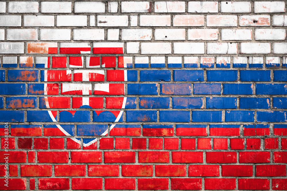 National  flag of the   Slovakia  on a grunge brick background.