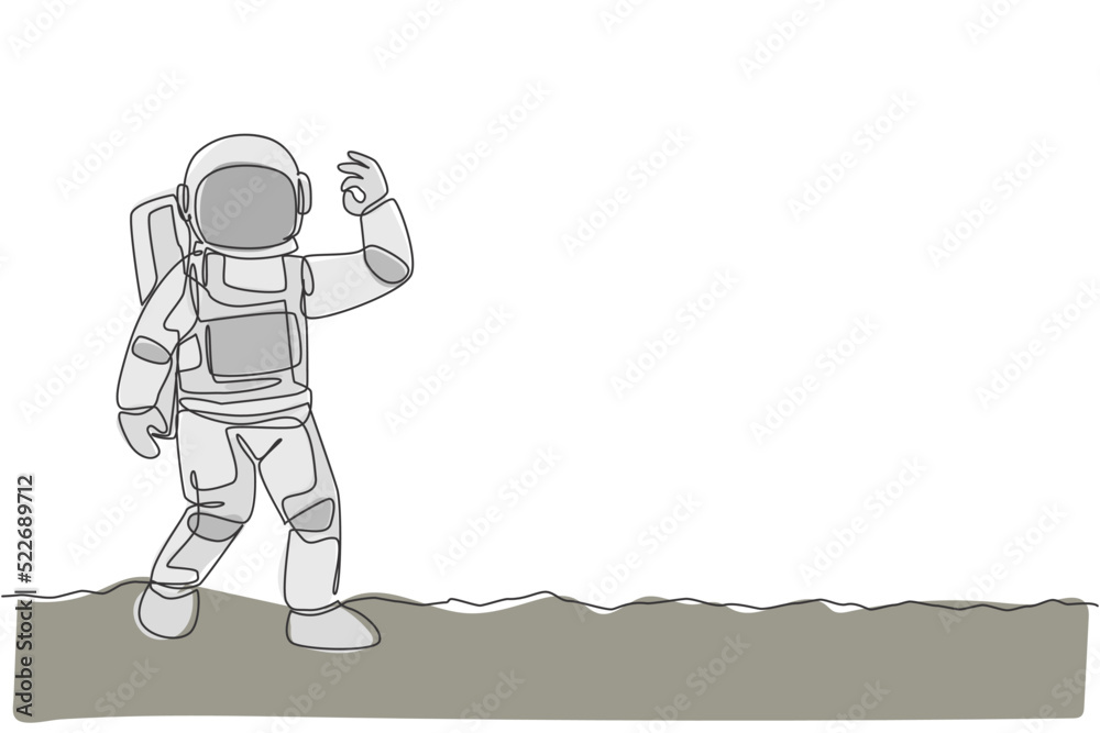 One single line drawing cosmonaut make okay gesture with his fingers in moon surface graphic vector illustration. Astronaut business office with outer space concept. Modern continuous line draw design