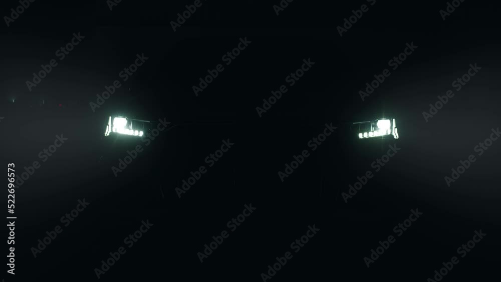 Close up of details of switched on led lights of anonymous prestigious luxury modern car. Car flashing light with blinking indicator. Car Blinker Light, car light blinking on continuously.
