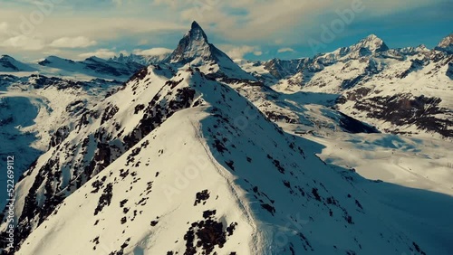 Aerial view of Gornergrat railway station in Switzerland. Snowy mountains. photo