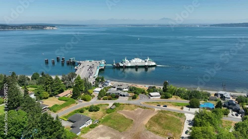 Wide aerial shot of the Clinton ferry terminal in action on Whidbey Island. photo