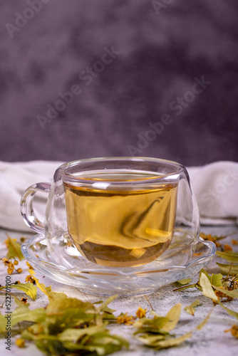 Linden tea. Linden tea on stone background. Herbal tea concept. Healthy drinks. close up