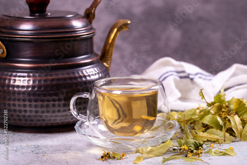 Linden tea. Linden tea on stone background. Herbal tea concept. Healthy drinks. close up
