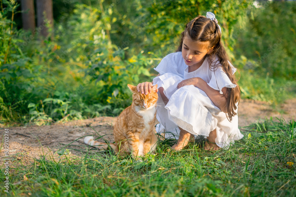 Girl with ginger cat. Beautiful portrait of girl with ginger cat in the hands. Girl with ginger cat. Beautiful portrait of girl with ginger cat in the hands.